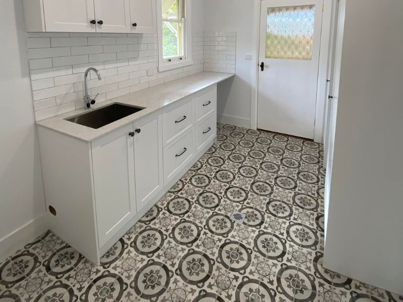 renovation patterned floor tiling and splashback